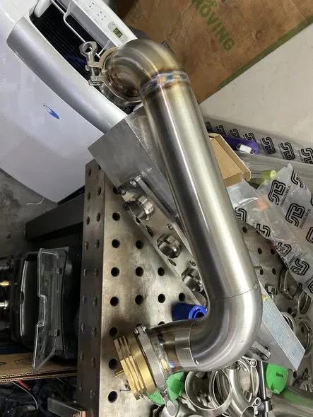 Polished stainless intake piping fabricated in-house