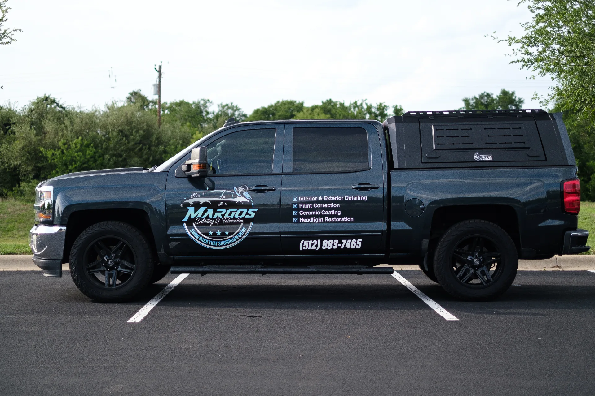 Margos Detailing branded truck with services listed