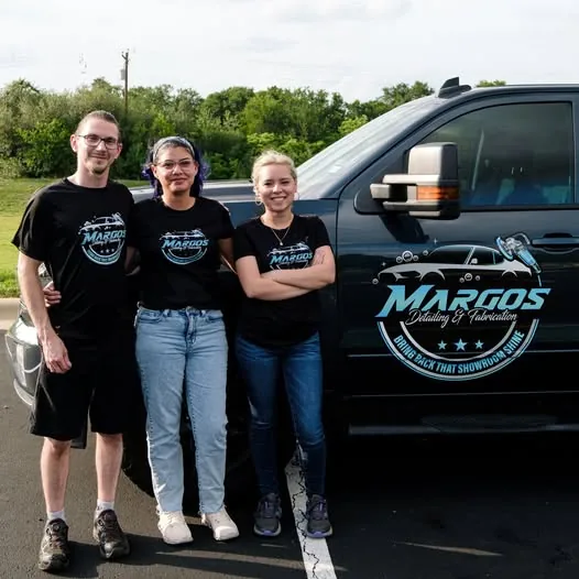 Gregory Margos and team standing beside the Margos Detailing & Fabrication truck