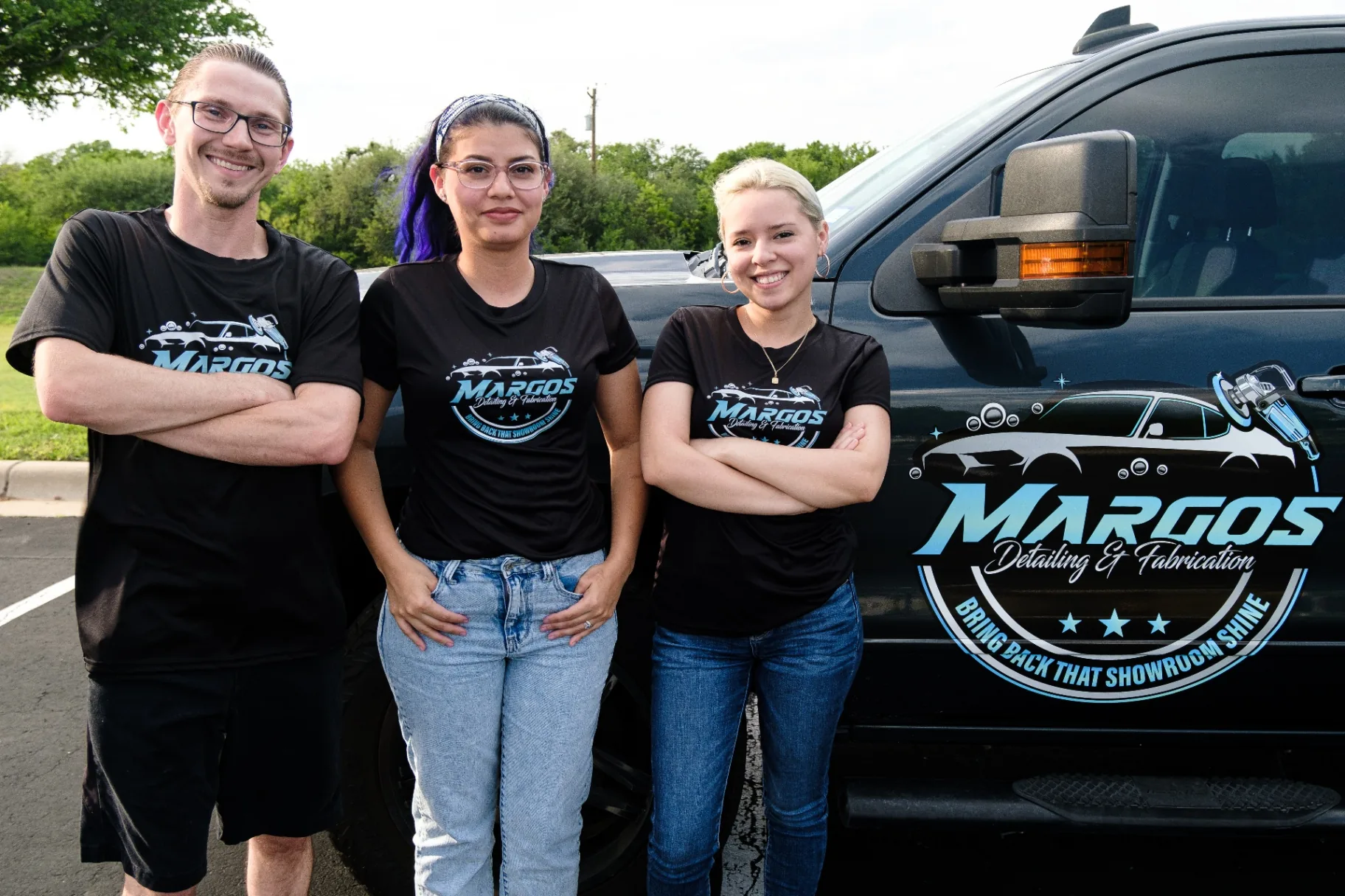 Gregory Margos and team standing beside the Margos Detailing truck